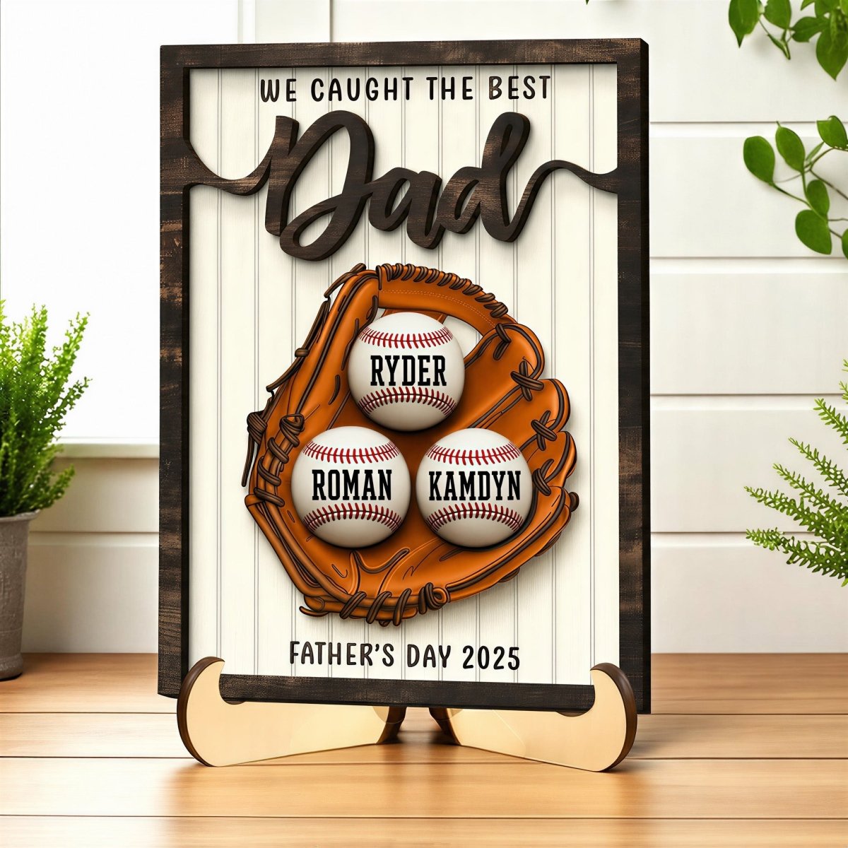 Personalized Father's Day baseball desk plaque for Dad. Custom wooden kids name sign featuring a 3D baseball glove, rustic frame, and customized baseballs displayed on an easel stand.