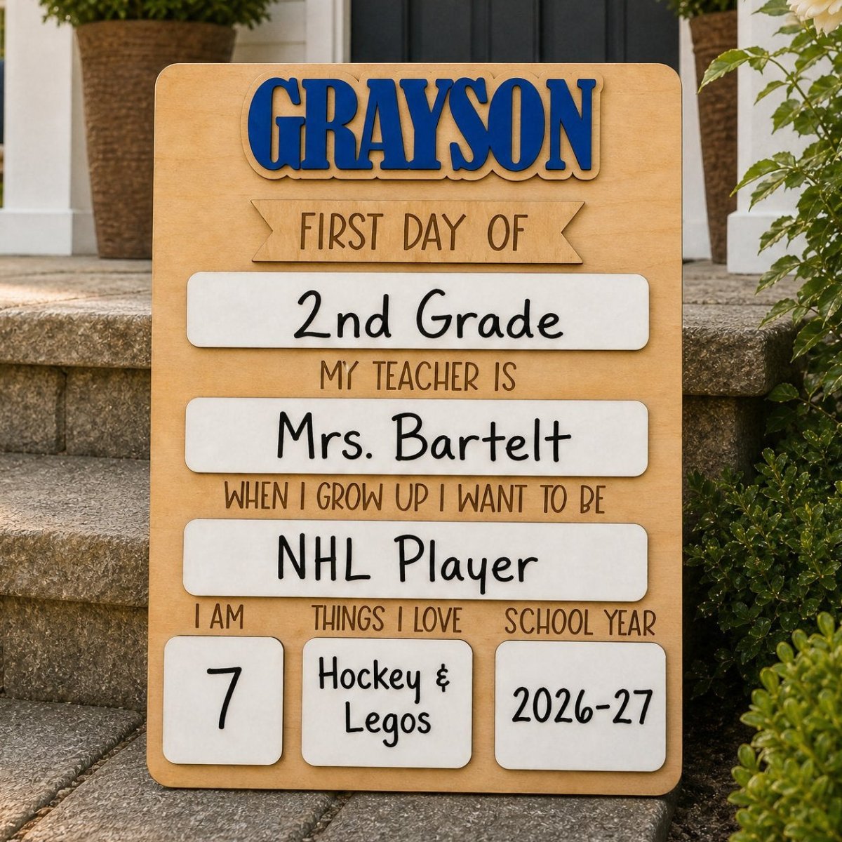 Personalized rectangle first day of school sign on front porch steps — Grayson maple wood milestone board close up