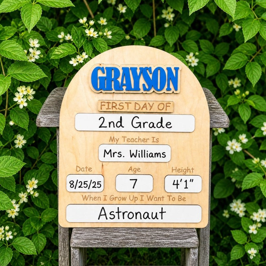 Custom wooden first and last day of school photo prop. Rounded arch maple board with 3D colorful name, Velcro interchangeable pieces, and dry-erase milestone sections.